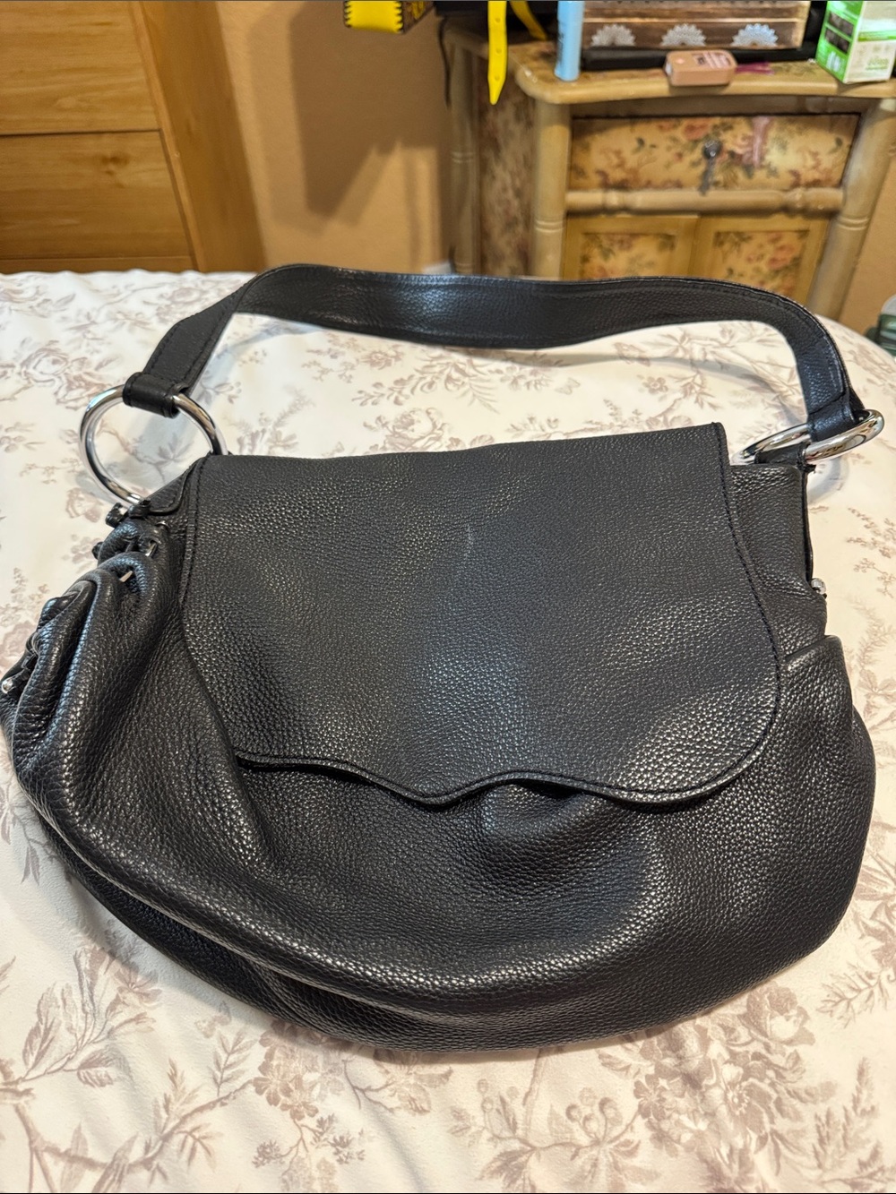 Black Pebbled Leather Shoulder Bag with Silver Rings